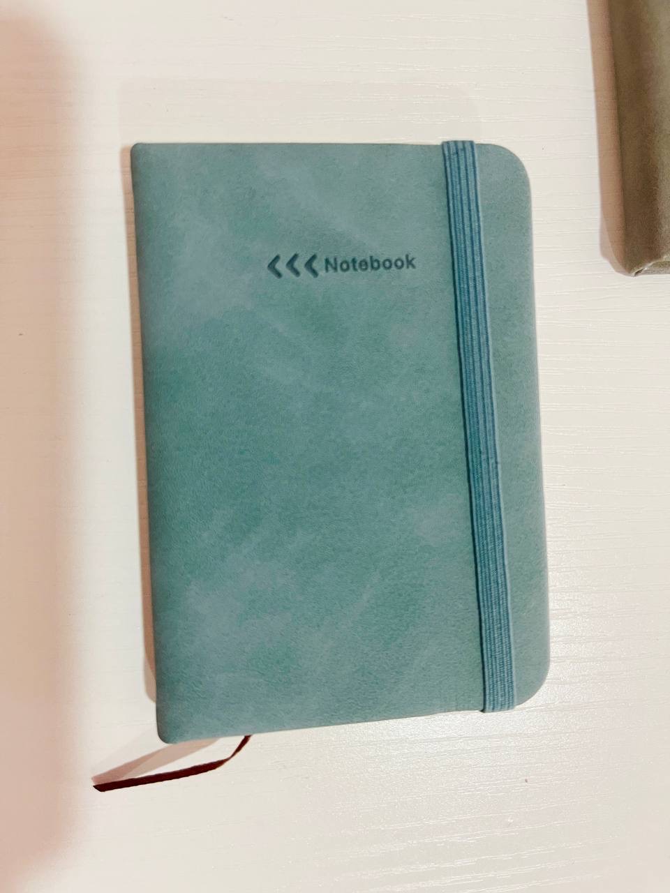 تیانوسی تێبینی